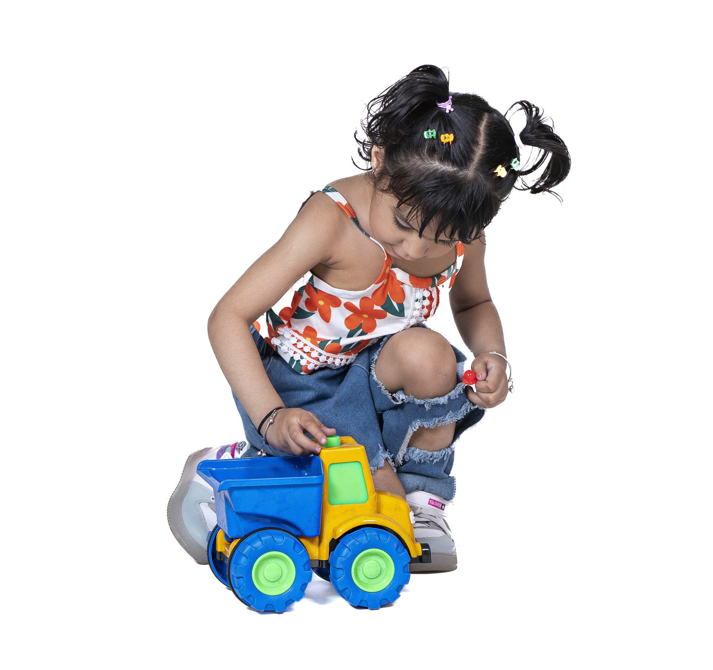 ToyBharat Mr Dumper Friction Toy Truck is a multicolour construction vehicle for kids aged 1-6 years. With a realistic design, it's a safe, durable, non-toxic gift toy for boys and girls for indoor outdoor play.