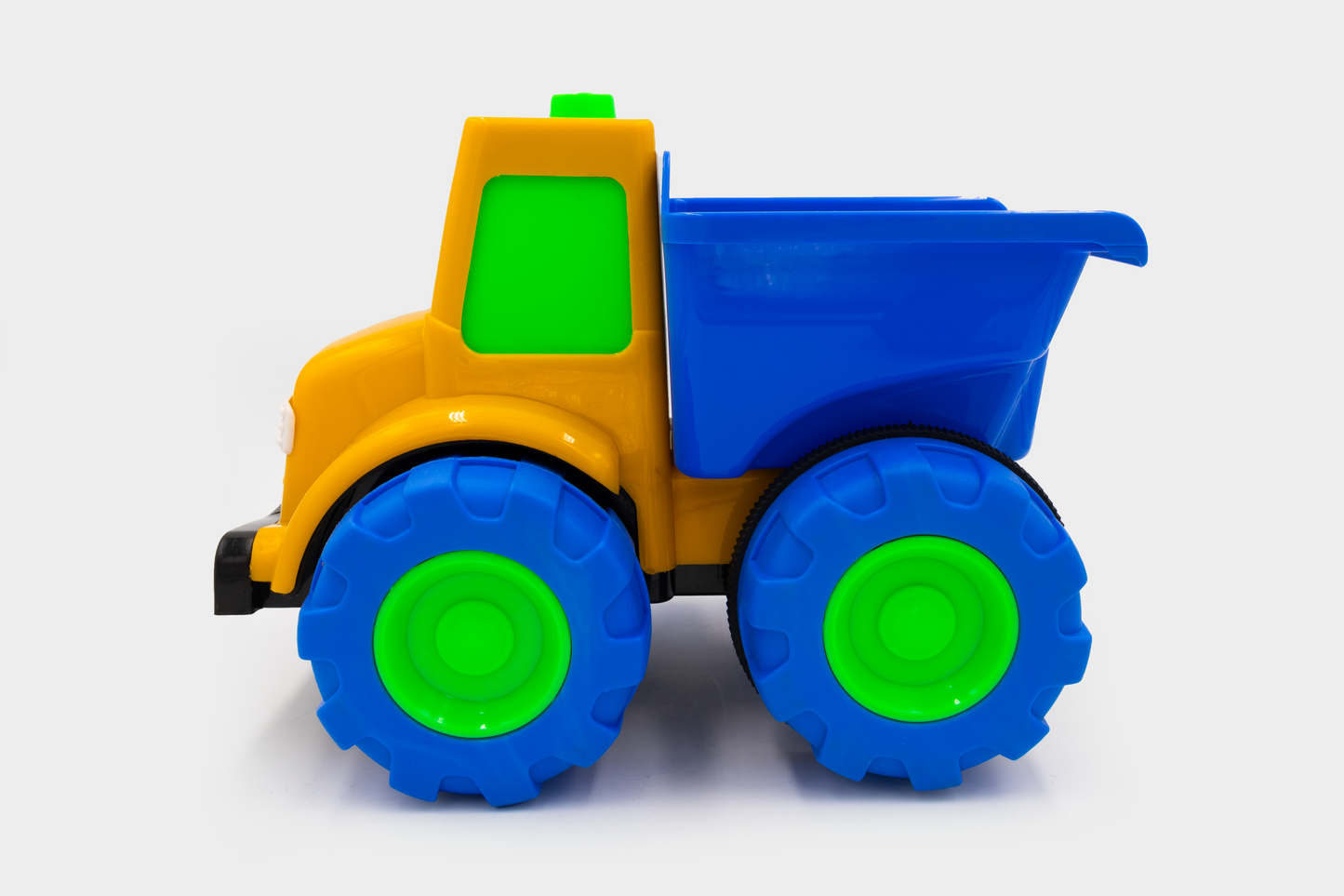 ToyBharat Mr Dumper Friction Toy Truck is a multicolour construction vehicle for kids aged 1-6 years. With a realistic design, it's a safe, durable, non-toxic gift toy for boys and girls for indoor outdoor play.