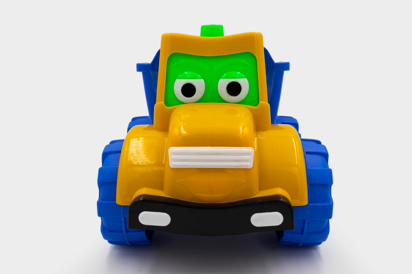 ToyBharat Mr Dumper Friction Toy Truck is a multicolour construction vehicle for kids aged 1-6 years. With a realistic design, it's a safe, durable, non-toxic gift toy for boys and girls for indoor outdoor play.