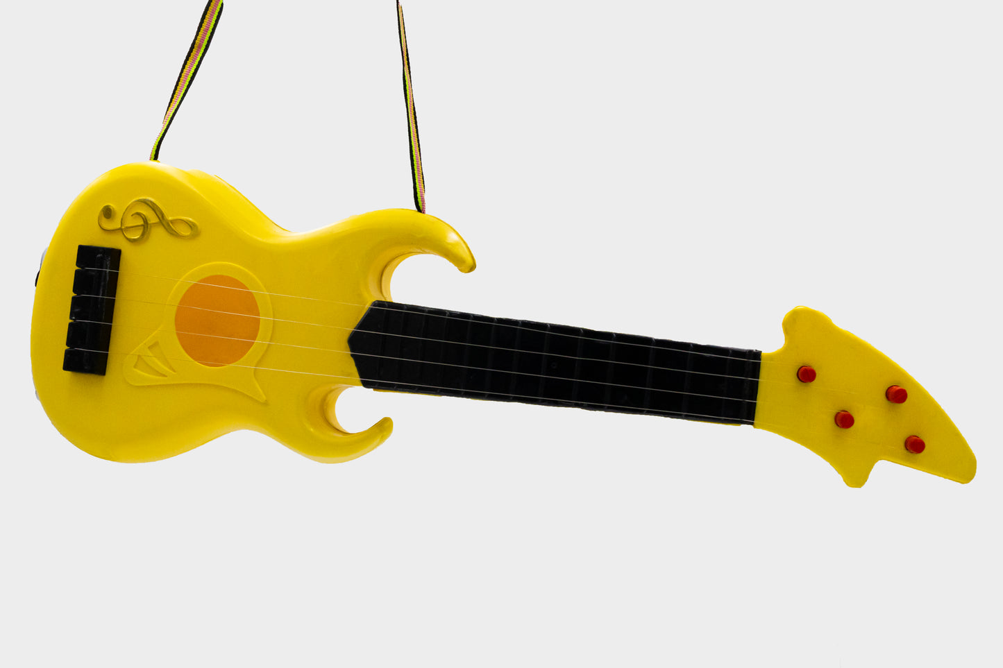 ToyBharat Rocking Guitar is a vibrant multicolour musical toy made in India, perfect for kids aged 1-6 years. This interactive toy promotes music learning and indoor-outdoor play with safe, non-toxic material.