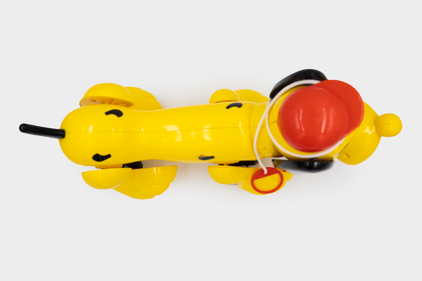 ToyBharat My Snoopy Dog Pull Along Toy is a multicolour travel toy for kids aged 1-6 years. With realistic dog design, it boosts motor skills, encourages walking, and ensures safe indoor and outdoor play.