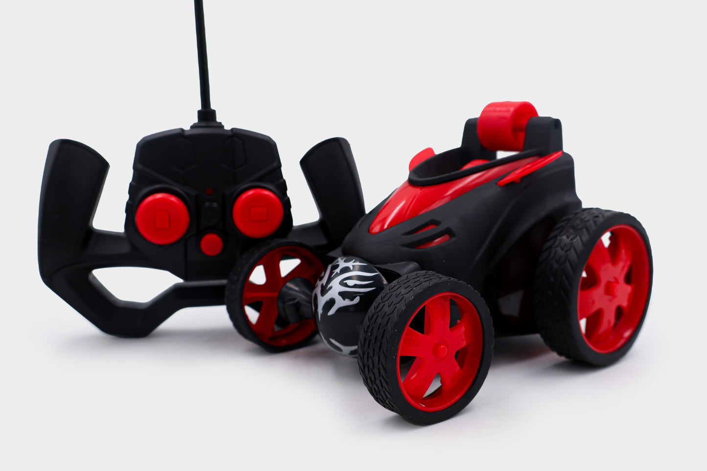 ToyBharat RC Stunt Remote Control Car is a multicolour electronic toy that performs flips, spins, and 360° rotations. A safe and exciting toy perfect for indoor and outdoor play and an ideal gift for kids.