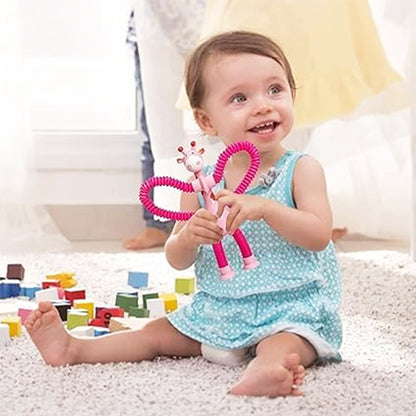 ToyBharat This Giraffe-Shaped Telescopic Suction Toy (Set of 1) is a fun, stretchy travel essential for toddlers. Safe, colorful, and easy to use—ideal for kids aged 1+ during flights, car rides, or at home.