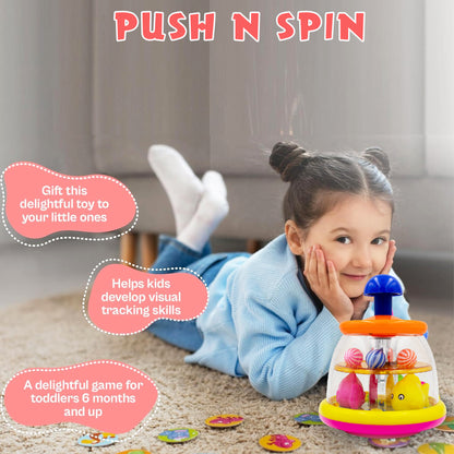 ToyBharat Push & Spin Fish & Ball Toy features a musical spinner with colorful fish and light-up balls. A multicolour interactive toy for toddlers that promotes learning through music, motion, and bright visuals.