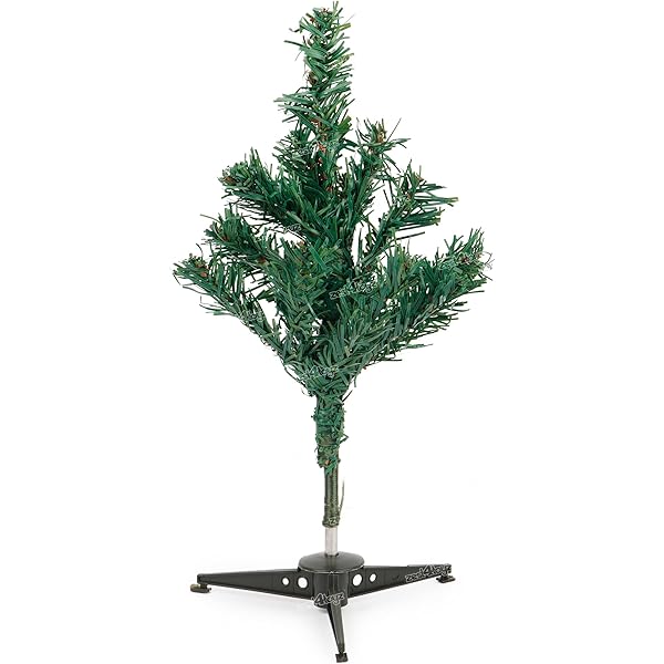 Small artificial Christmas tree with stand on a white background